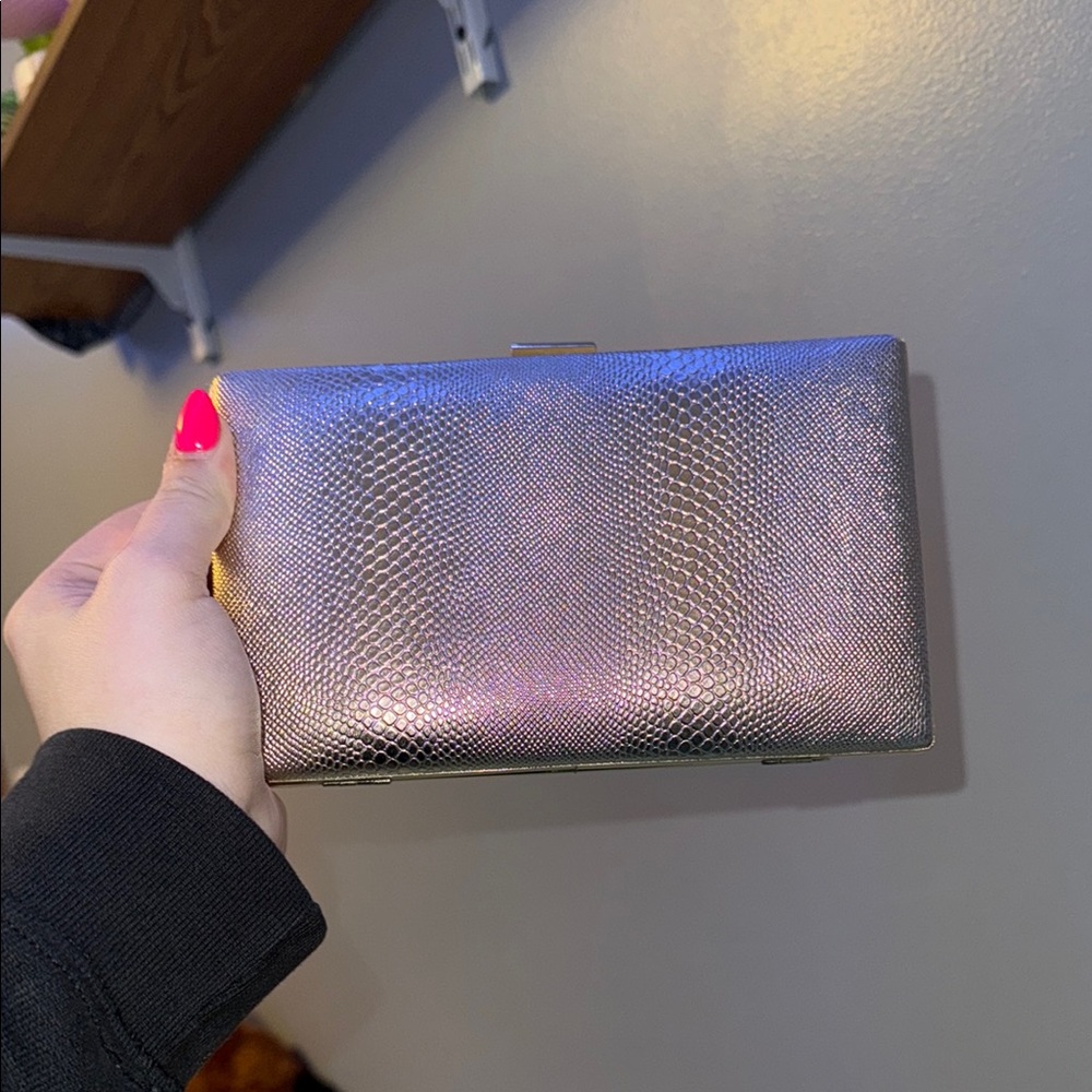 Charming Charlie Silver Clutch with Textured Snakeskin Design